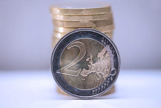 Two euro coins, close-up of a coin with the value of 2 euros.