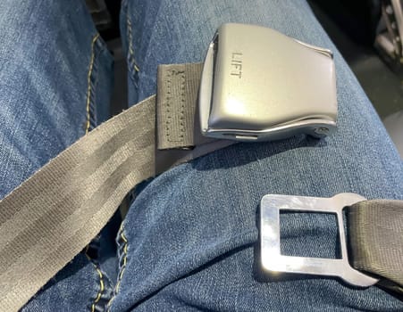 The belt in an airplane with which passengers are supposed to secure themselves during the flight.