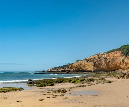 Maria Luisa beach with rock formation in Albufeira, Algarve, Portugal...
