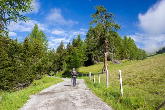 man trekking in the mountains, Alps in Austria, Lienzer Dolomiten, East Tyrol