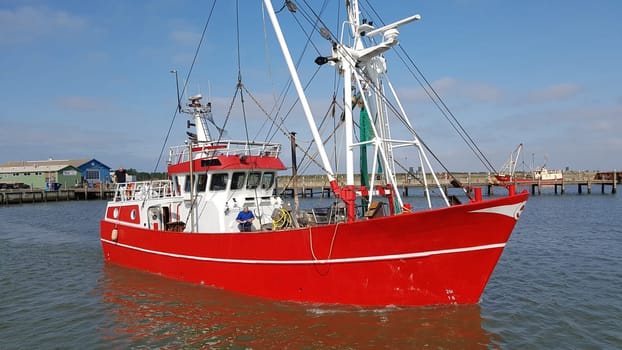 Fishing boat in the harbour of the island of Roemoe in Denmark. Fishing boat in the harbor of Roemoe island in Denmark.