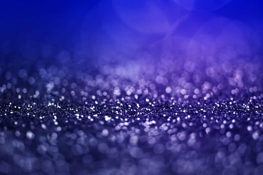 Light abstract dark bokeh christmas circle color glitter blurred black background