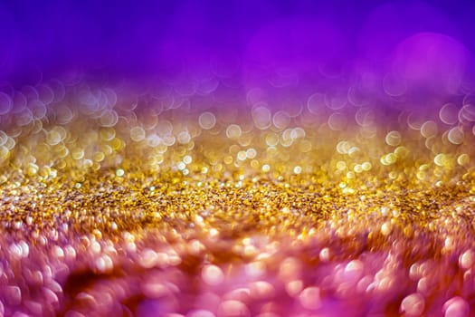 Glitter light abstract multicolor bokeh christmas light blurred background