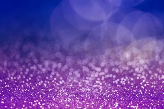 Light abstract dark bokeh christmas circle color glitter blurred black background