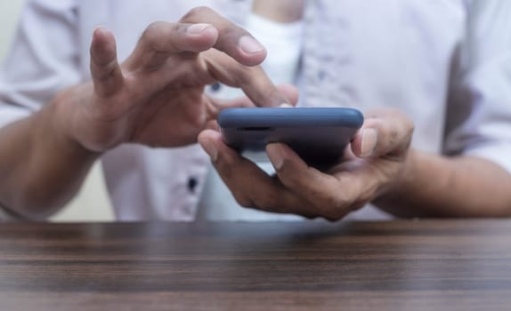 Age of technology People's, Use of technology in the modern era, Interconnection by internet network, Communication with the Internet, Hand man using smartphone blurred background