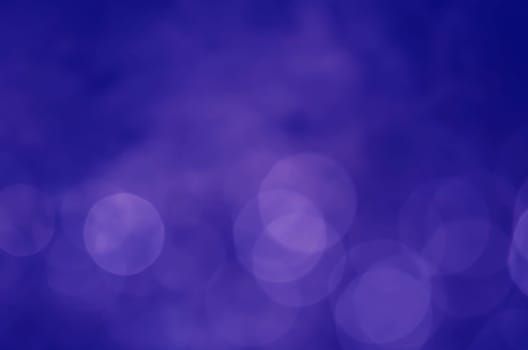 Light abstract dark bokeh christmas circle color glitter blurred black background