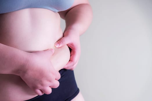 Fat woman, Shape up healthy stomach muscle, and diet lifestyle, to reduce belly concept.