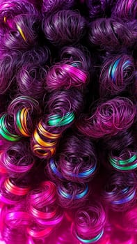 Curly hair texture. Bright pink, purple curly curls. High quality photo