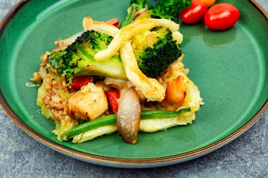 Homemade pie with Brussels sprouts, pumpkin and broccoli stuffed with meat