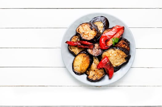 Grilled eggplant and grilled bell pepper on a plate, vegetables bbq