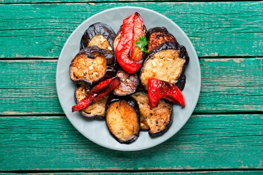 Grilled eggplant and grilled bell pepper on a plate, vegetables bbq