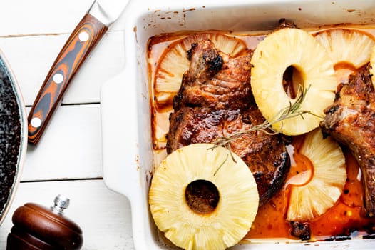 Fresh delicious grilled pork chop steak with roasted pineapple