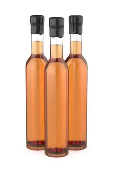 Three glass bottles with whisky, brandy or other alcoholic beverages