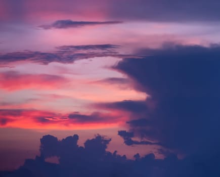 Background of colorful dramatic sunset with twilight color sky and clouds