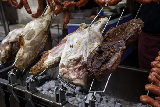 Detail of traditionally fire-roasted pork legs