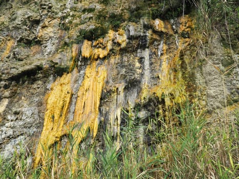 Drainage of organic wastewater from an overflowing sewerage system from a cliff to the Vysoky Bereg beach in Anapa, Krasnodar Territory, August 2021. Feces flow down. Inaction of city utilities.