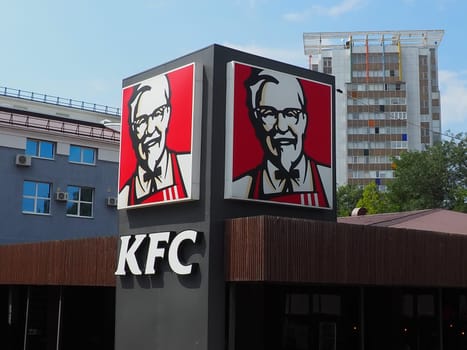 Anapa, Russia, August 23, 2021. KFC restaurant. Kentucky Fried Chicken, or KFC for short, is an international foodservice chain specializing in chicken dishes. Brand, logo or outdoor advertising.