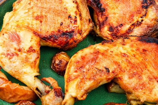 Prepared barbecue chicken thighs. Fried chicken meat quarters. Top view