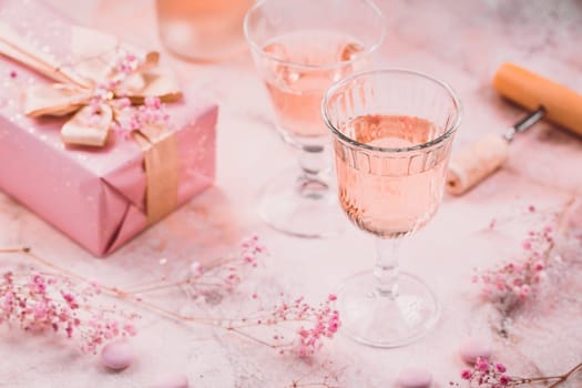 Rose sparkling wine, french macarons and box of chocolates for Valentime, mothers day or birthday