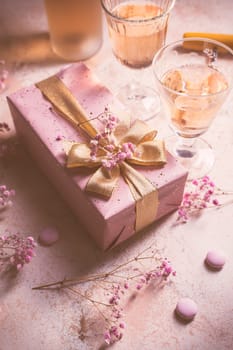 Rose sparkling wine, french macarons and box of chocolates for Valentime, mothers day or birthday
