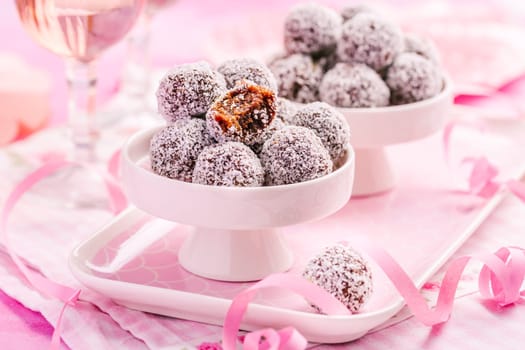 Energy protein balls with healthy ingredients, made with dates, peanut butter, flax and chia seeds, oats, almond and chocolate drops
