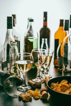 After party - empty bottles, concept of alcoholism, alcohol abuse and addiction
