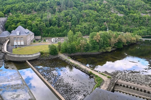 View from the Edertalsperre to the river Eder, forest and house