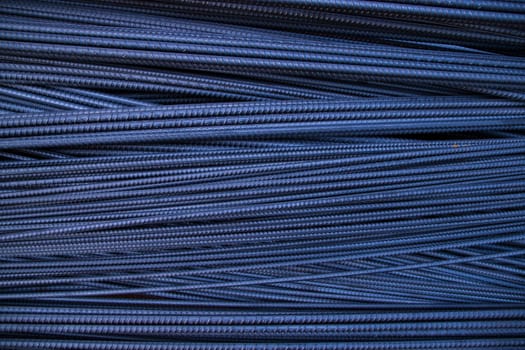 Close-up of blue steel wire for construction and industrial background. Selective focus