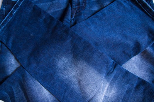 folded blue jeans pant pattern texture background