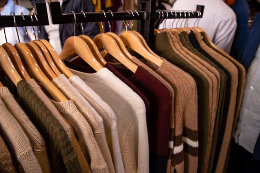 Clothes on hangers in a clothing store, close-up