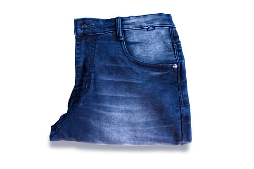 folded blue jeans pant isolated white background