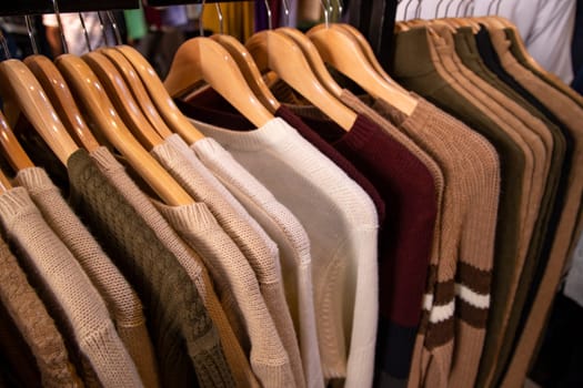 Clothes on hangers in a clothing store, close-up