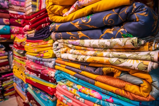 Artistic variety shade tone colors Bed sheets stacked on retail Shop Shelf to sale