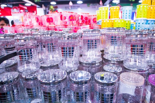 Transparent Plastic jur on a shelf in a supermarket, closeup of photo