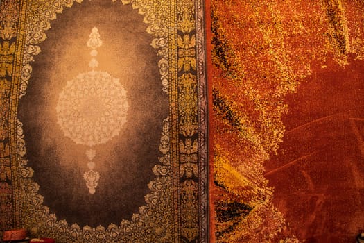 Carpets wall mat with a pattern on a background of orange and red