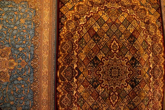 Carpets wall mat with a pattern on a background of orange and red