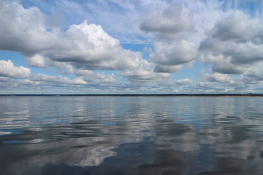 picturesque sea and sky landscape cumulus clouds float over the sea
