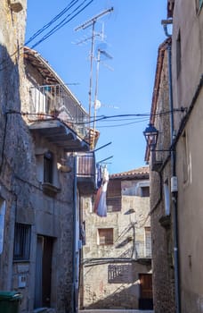 Hoyos, beautiful little town in Sierra de Gata, Caceres, Extremadura, Spain. Nice shaddy street