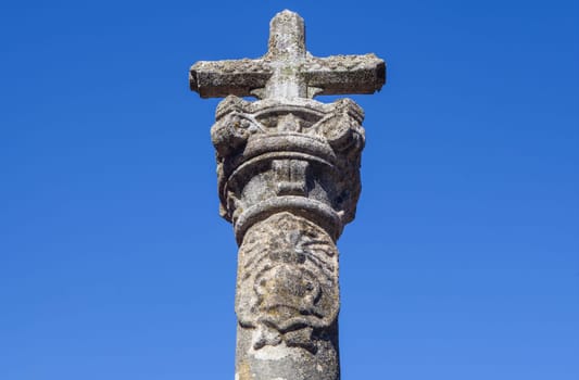 Hoyos, beautiful little town in Sierra de Gata, Caceres, Extremadura, Spain. Old granite cross pole