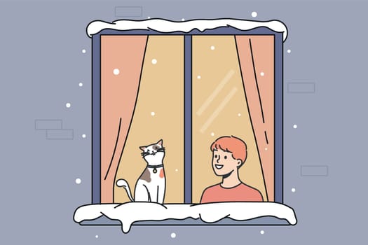 Smiling little boy child and cat sit in window look at street in winter. Happy kid with domestic pet indoors in cozy home. Vector illustration.