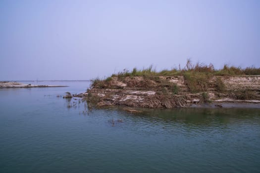 Natural Landscape view Coast of the Padma river with sand dunes and grass