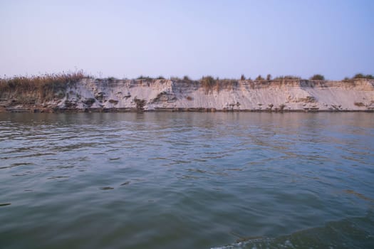Natural Landscape view Coast of the Padma river with sand dunes and grass