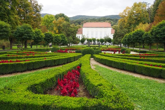 Banja Koviljaca, Serbia, Guchevo, Loznica, Sept 30 2022 Rehabilitation center with sulfur and iron mineral waters. Landscape to the Kur-salon with grass, lawns, walking paths and flowers. Royal Palace
