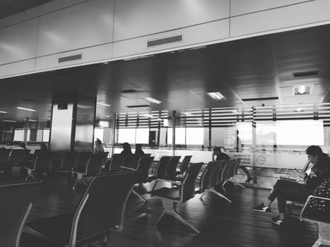 Istanbul Turkey, Sabiha Gokcen Airport Uluslararasi Havalimani 04.08.2022 The waiting room at the airport for stay of passengers. People passengers waiting to board the flight. Airport interior.
