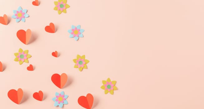 Happy Valentine's day concept. Symbol of love paper art with copy space for text, handmade red paper hearts shape cutting pastel pink background, Mother's Day