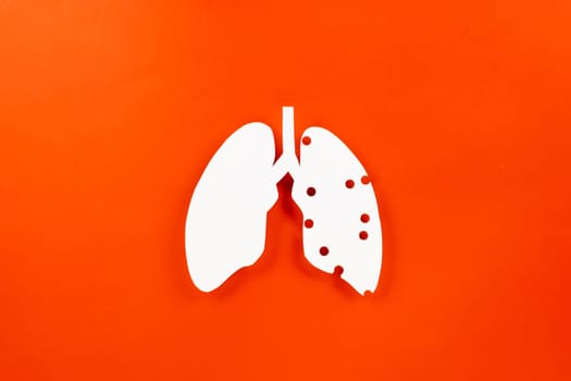 Lungs paper cutting symbol on red background, copy space, concept of world TB day, banner background design, respiratory diseases, lung cancer awareness, Healthcare, World tuberculosis day
