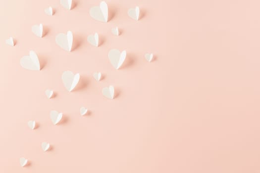 Happy Valentines Day background. Top view flat lay of paper elements cutting white hearts shape flying on pink background, Valentine Love day concept, Banner template design of holiday