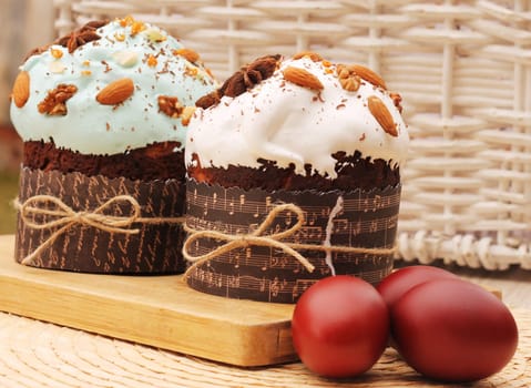 Easter eggs and cakes with icing nuts and anise stars