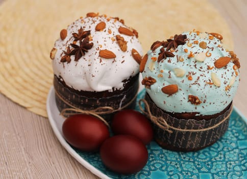 Easter eggs and cakes with icing nuts and anise stars