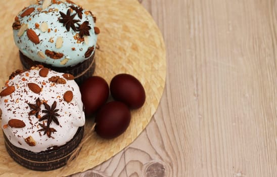 Easter eggs and cakes with icing nuts and anise stars